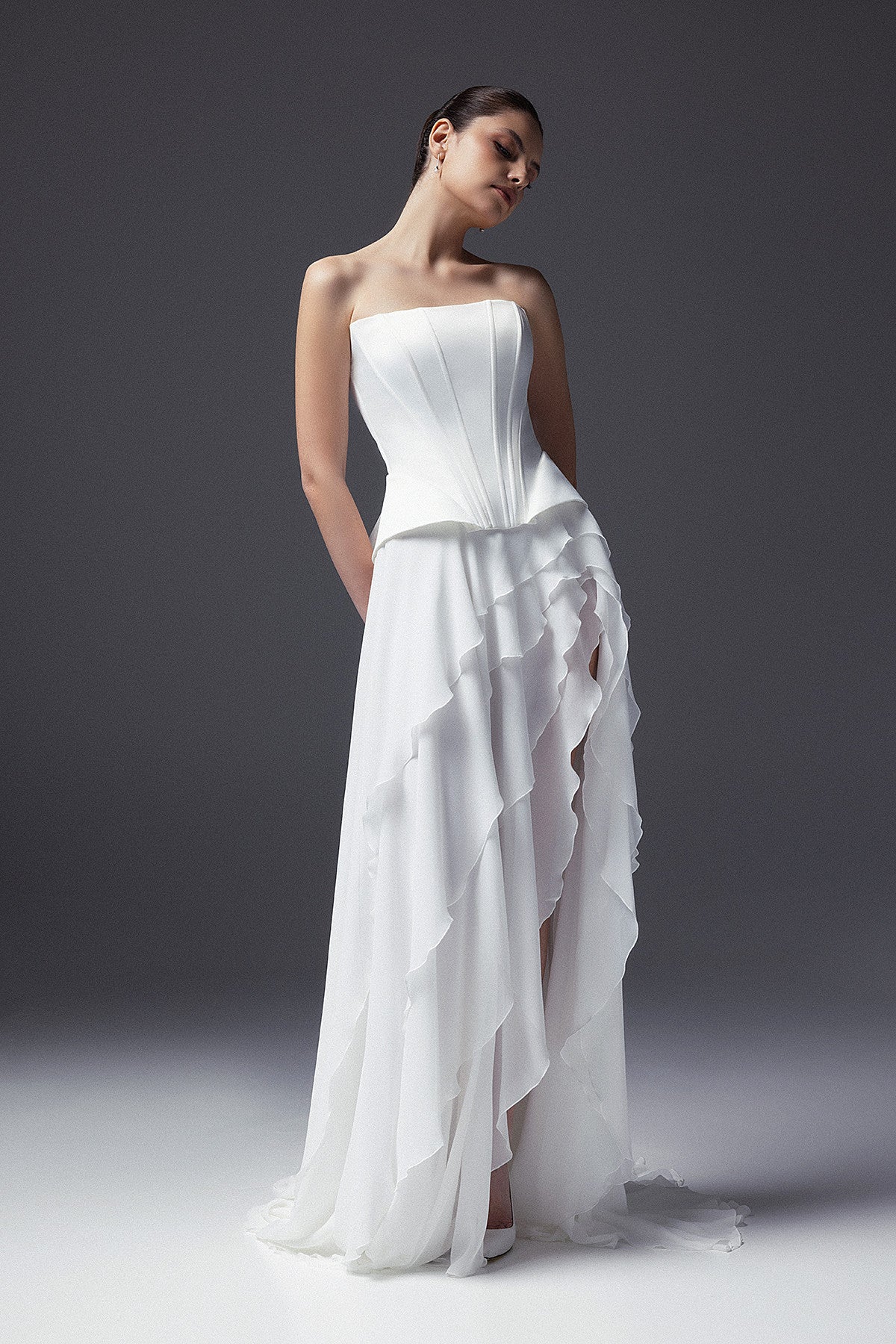 Two Piece Wedding Dress Greta with Chiffon Asymmetric Maxi Skirt and Strapless Peplum Corset 10 US (42 EU) / Off-white Two Piece Wedding Dress Greta with Chiffon Asymmetric Maxi Skirt and Strapless Peplum Corset 10 US (42 EU) / Off-white