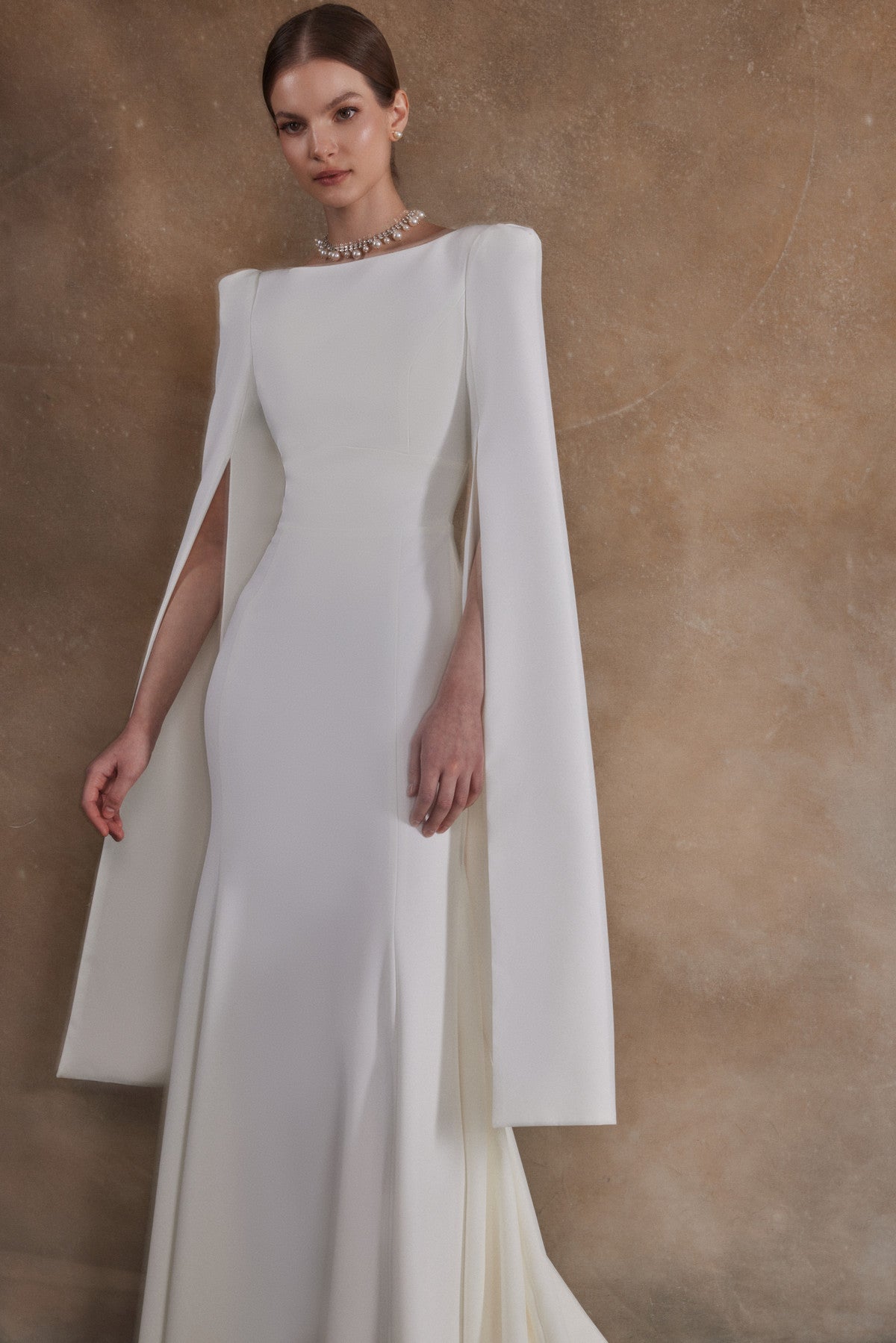 Crepe fit & flare wedding dress with long cape sleeve Ashlee-1 Ready to Ship / Ivory / 4 US (36 EU) Crepe fit & flare wedding dress with long cape sleeve Ashlee-1 Ready to Ship / Ivory / 4 US (36 EU)